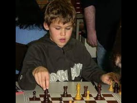 Young Magnus Carlsen (13 y/o) crushed GM Valery Popov in 26 moves (2004)