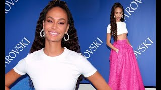 Joan Smalls flaunts her washboard abs and underboob at the CFDA Awards