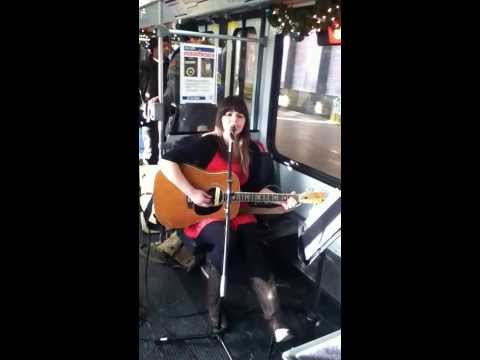 Beth Bombara performs on the MetroLink Holiday Magic Train