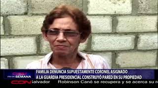 Familia denuncia supuestamente CORONEL asignado a la GUARDIA PRESIDENCIAL construyó pared en su propiedad