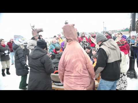 Sled Dogs to St. Paul Rally with Stonebridge Singers Drum from Grand Portage