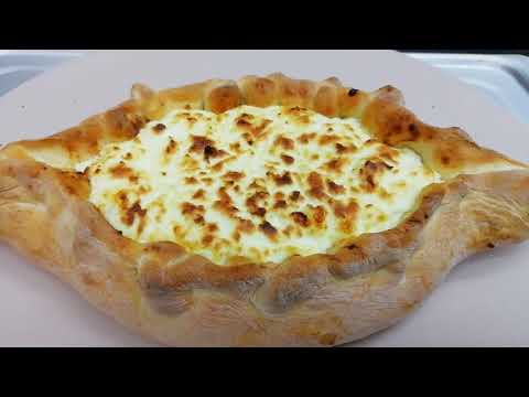 Khachapuri Adjaruli - a 'boat' Georgian cheese bread