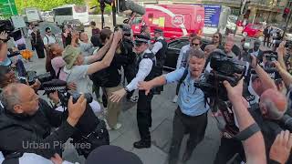 Russell Brand enters and exits Westminster Magistrates Court in London