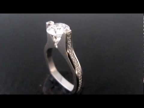 Tension set with accent diamonds