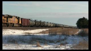 preview picture of video 'Dueling Horns Train Meet_BNSF Staples Sub w/UP Power'