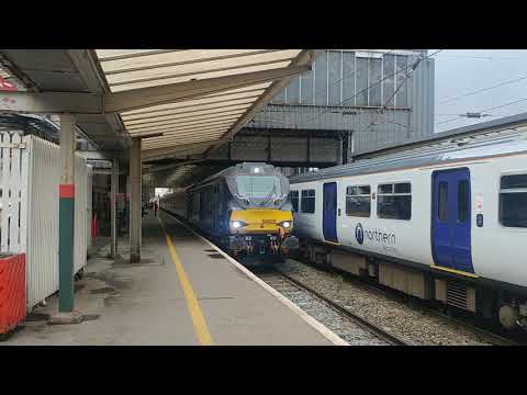 Direct Rail Services 68023 and 68030 leave Preston