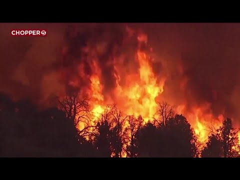 Dangerous fire, flood conditions prompt states of emergency