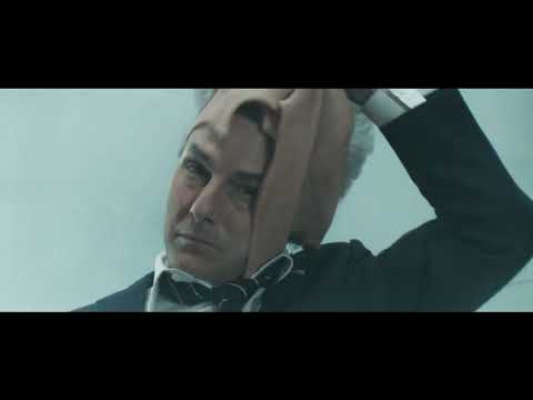End-card trailer frame with jet-cabin light and the Schifrin theme hitting the downbeat