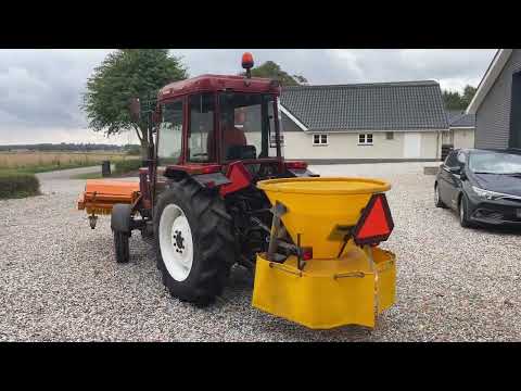 Video: New Holland 45-66S kompakttraktor med fejekost og saltspreder 1