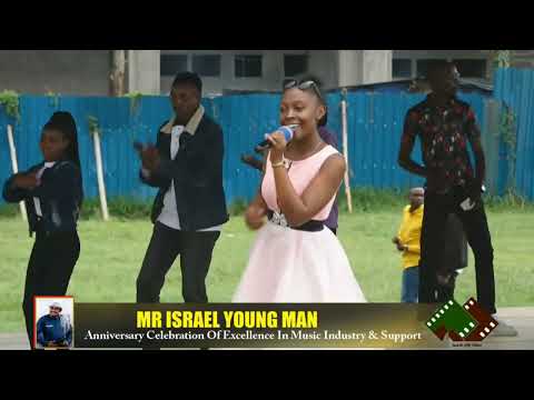 MR ISRAEL YOUNGMAN AT 13TH YEAR IN MUSIC. 