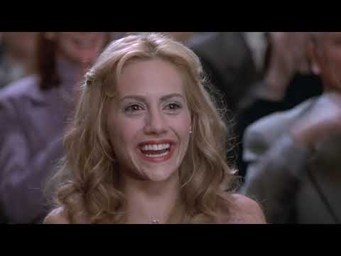 Music–scene pairing: diegetic stage lights and guitars during the recital as the lullaby becomes a pop catharsis