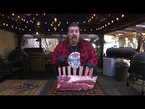 Massive 7 bone tomahawk prime rib roast on the big green egg