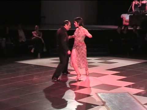  Osvaldo Zotto  and  Mariela Gisele Avanzi  are  dancing  to  the  tango  "  Para Dos  "