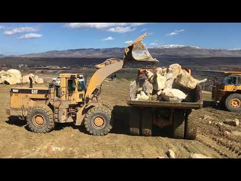 Caterpillar 988F Wheel Loader Loading Rocks At Komatsu Dumpers - Kyvos Ateve
