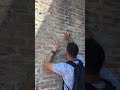 Italy searching for man who was filmed carving names into Rome's Colosseum | NBC4 Washington