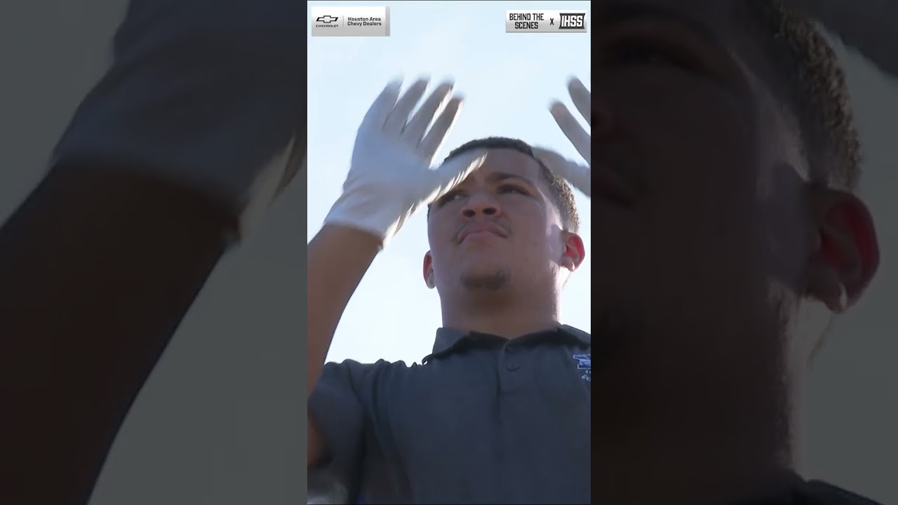 New Caney's Jayden Foster pulled double duty as a defensive end and drum major for the band