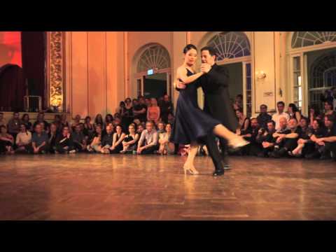  Joachim Dietiker  and  Michelle Marsidi  are  dancing  to  "  Valsecito Amigo  "  by  Solo Tango Orquesta  at  TangoFest Dresden  in  2016