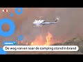 Kampeerders met helikopter gered uit bosbrand