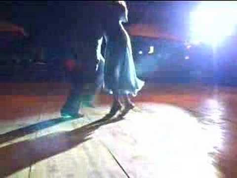  Jennifer Bratt  and  Ney Melo  are  dancing  to  the  tango  "  No MIentas  "
