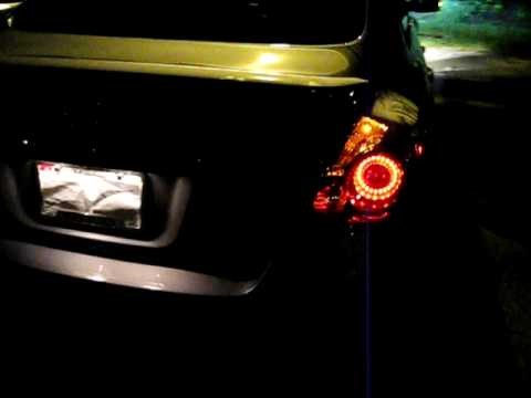 Nissan Altima 08 Sedan - Stock vs Depo (black) tailights on Precision Gray - night testing