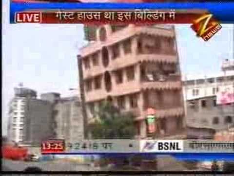 Topzwaar gebouw in Surat  (India) valt om