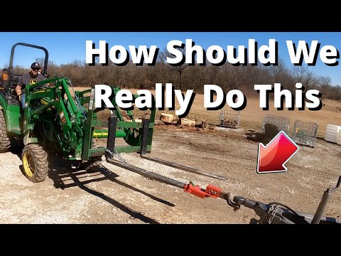 Part of a video titled The Best Way to Move a Trailer With a Tractor - YouTube