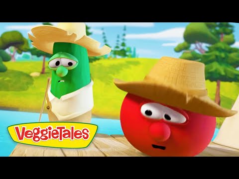 Two VeggieTales characters—a cucumber and a tomato—wear straw hats on a wooden dock by a sunny river, with surprised expressions.