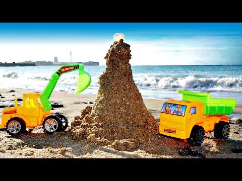 Jeu de plage avec sable: construction d'un phare