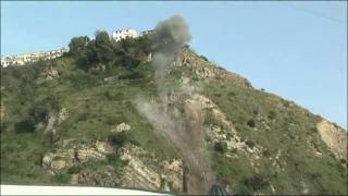 preview picture of video 'Cetraro 28/02/2010 la Protezione Civile fa esplodere il masso che minaccia la S.S.18.'