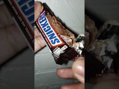 Unwrapping my favorite snickers chocolate #asmr #snickers #chocolate #shorts