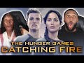 OUR FIRST TIME WATCHING THE HUNGER GAMES: CATCHING FIRE | MOVIE REACTION