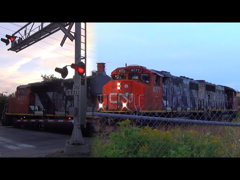 CN 532 Approaches the Perth St. Railroad Crossing with a lot of Tanks and a Single Hopper