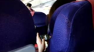 preview picture of video 'Airline passenger taking pictures of herself,  she is so Vain.'