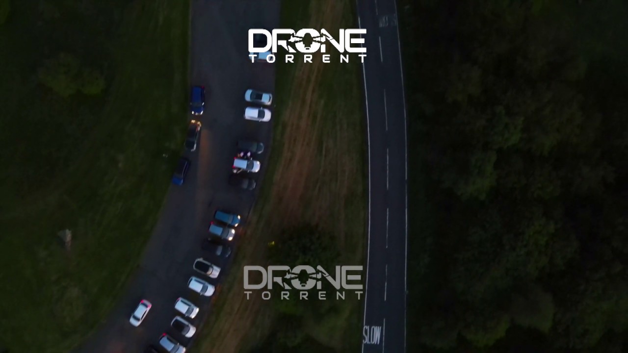 Download aerial footage of a parking lot at night