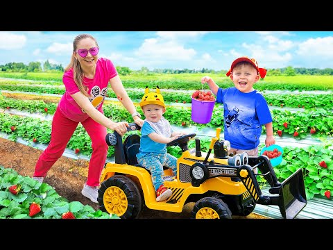 Oliver and Mom learn to harvest berries at the farm