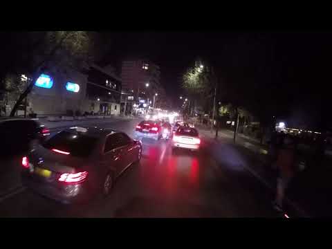 Thessaloniki the city in the night.Driving along the seafront and into the center of Thessaloniki