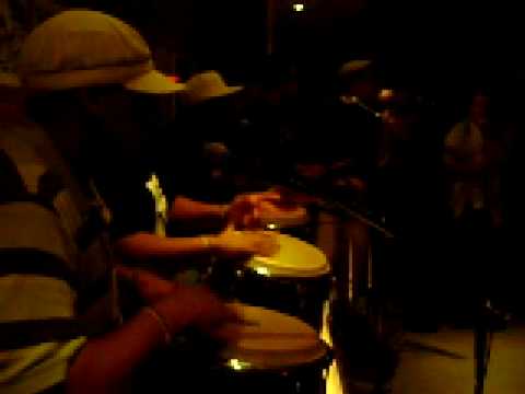 Susan Sanabria enjoying and dancing for Ochosi. with Ilu Aye