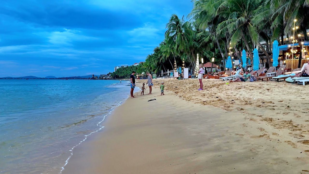 Experience the tranquility of Phu Quoc through a cinematic lens, featuring Long Beach's golden sunsets, palm-fringed shores, and serene coastal ambiance.
