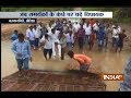 BJD MLA carried by his supporters to cross a waterlogged stretch in Odisha