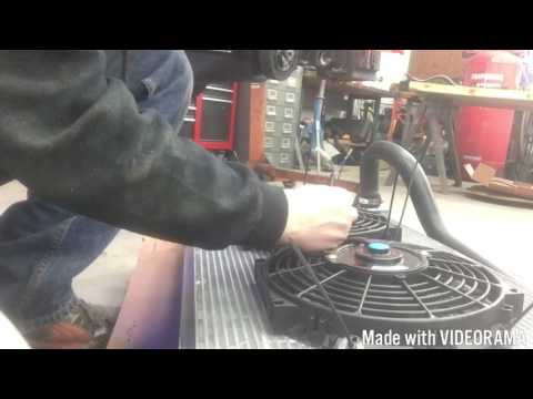 Mounting electric fans on radiator
