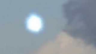 UFO orb swells to swallow Chinook in flight 2012