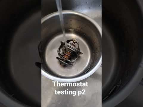 Thermostat testing marine engine