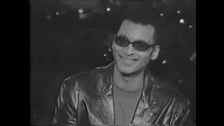 Jon Secada performs at Walt Disney World Christmas Parade (1998)