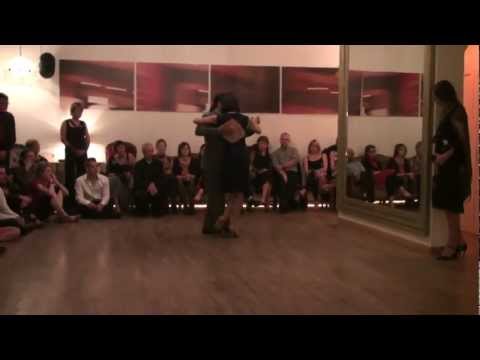  Adrian Costa  and  Amanda Costa  are  dancing  to  the  tango  "  Chique  "