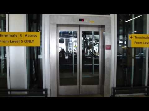 Awesome Full Glass Modern Traction Elevator at Yellow Parking, JFK Int'l Airport, Jamaica, NY