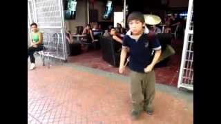 Little Boy Is An Amazing One Man Band