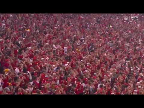 chiefs fans do the Tomahawk chop