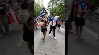 Zelina Vega and Damian Priest at NYC Puerto Rican parade