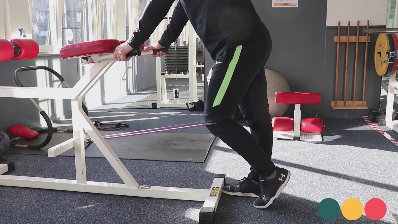 Video thumbnail: Extensie knie elastiek staand — instructievideo
