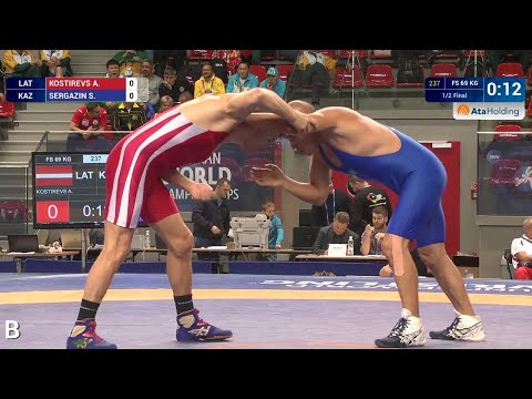 1/2 FS - 69 kg: S. SERGAZIN (KAZ) df. A. KOSTIREVS (LAT), 10-6